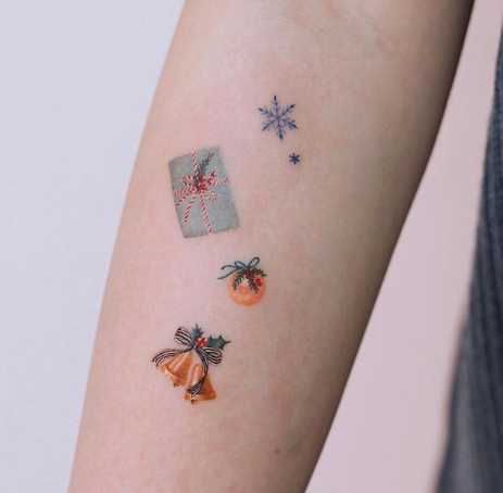 It's Giving Tuesday, So We're Giving You Holiday Tattoo Ideas