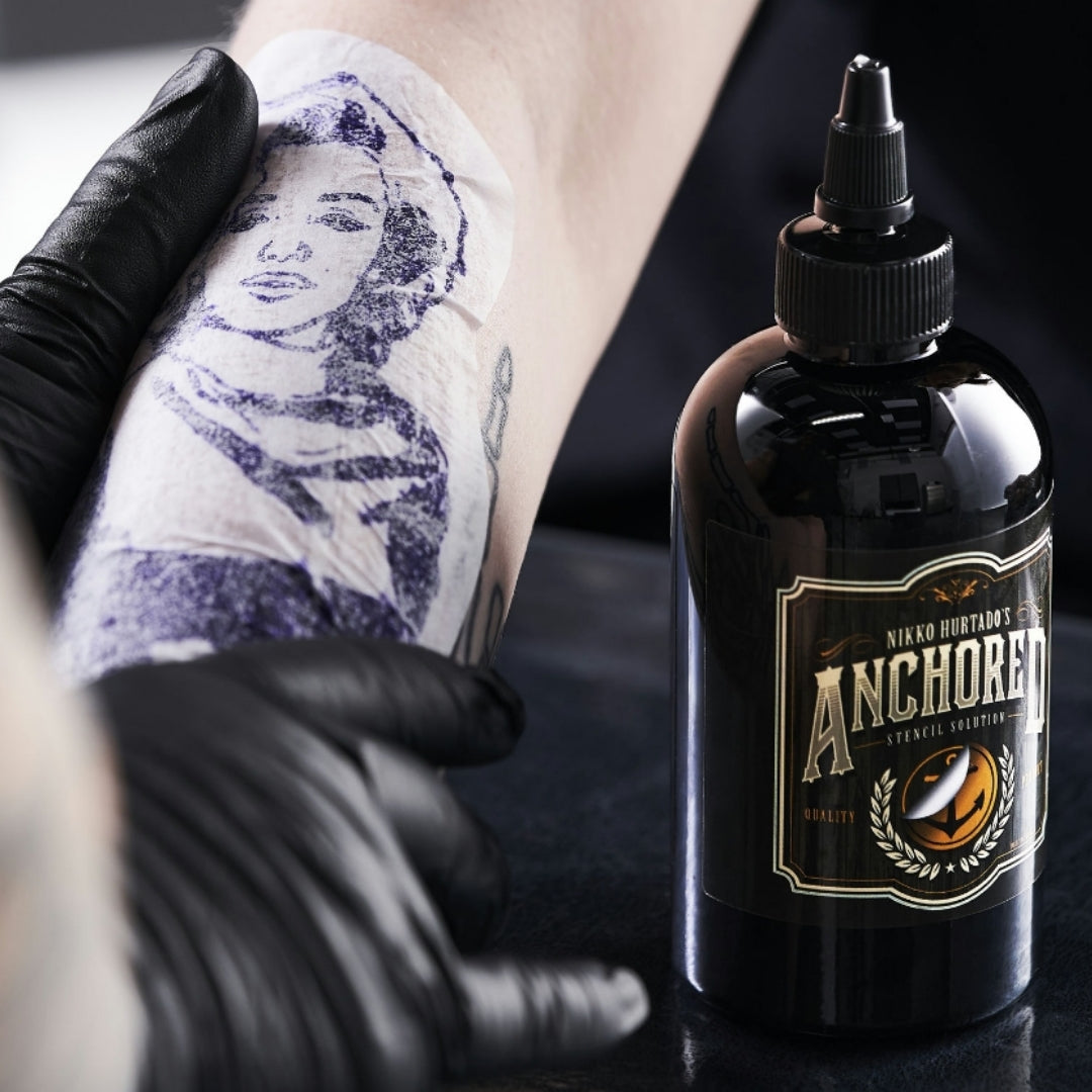 Close-up of a stencil being applied with Anchored stencil transfer solution