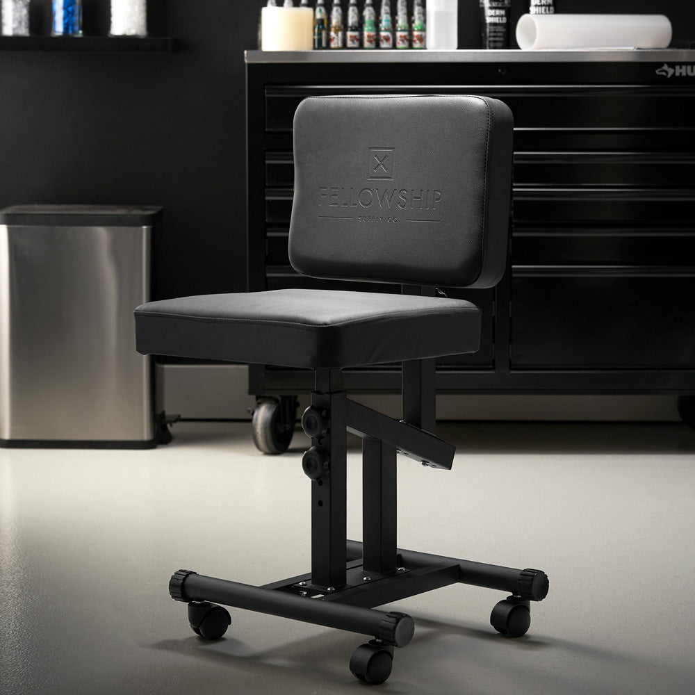 Fellowship Multi-Use Client Chair with Arm Rest - Ultimate Tattoo Supply