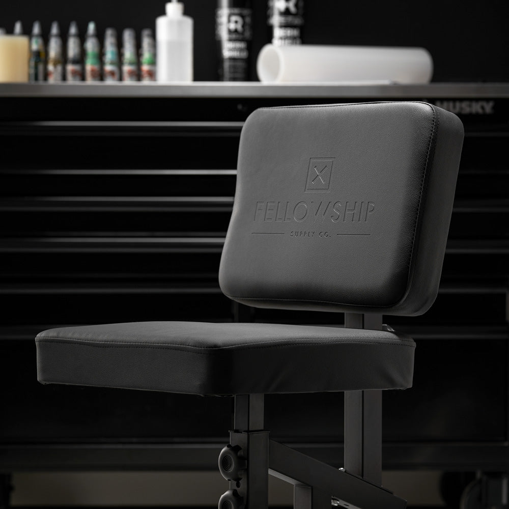 Fellowship Multi-Use Client Chair with Arm Rest - Ultimate Tattoo Supply