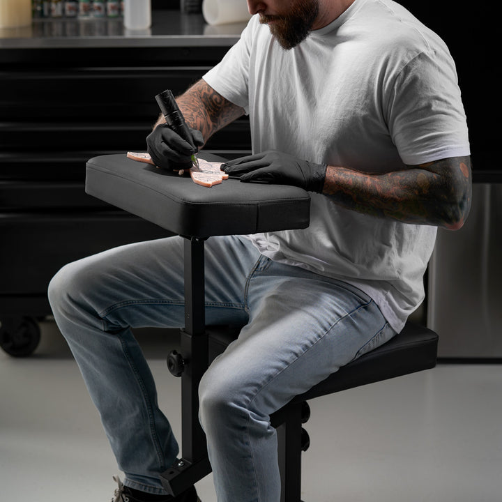 Fellowship Multi-Use Client Chair with Arm Rest - Ultimate Tattoo Supply