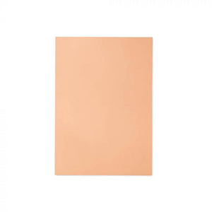 Pink-toned tattooable flesh in the shape of a rectangle on a white background.