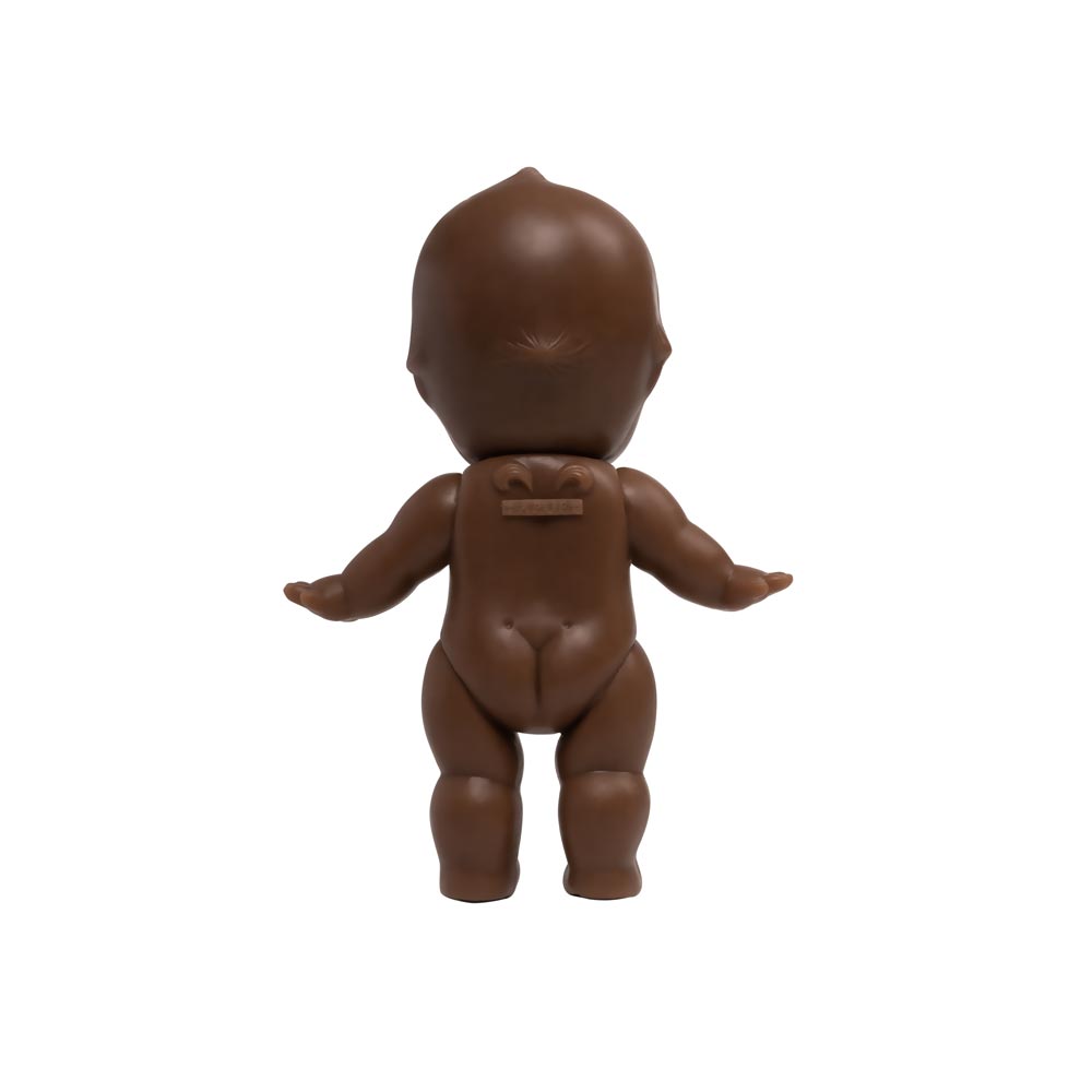 Dark-toned tattooable cutie doll back-facing with a white background.