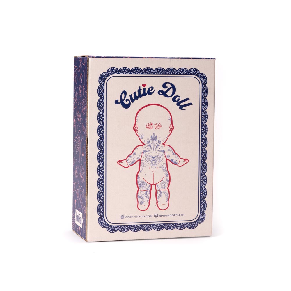 Back of tattooable cutie doll box on a white background.