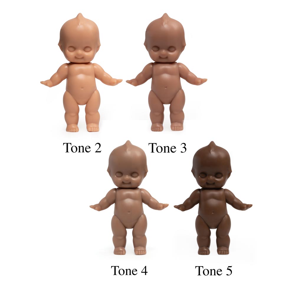 Four tattooable cutie dolls in varying skin-tones with a white background.
