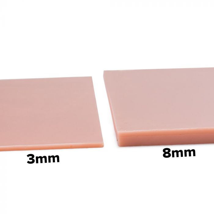 Pink-toned tattooable flesh in the shape of a horizontal rectangle on a white background.