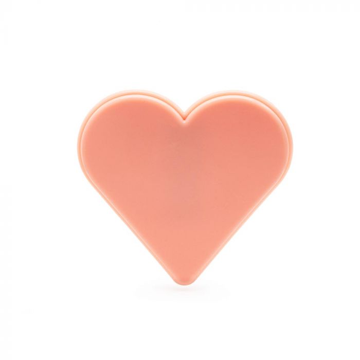 Light-toned tattooable flesh in the shape of a stylized heart.