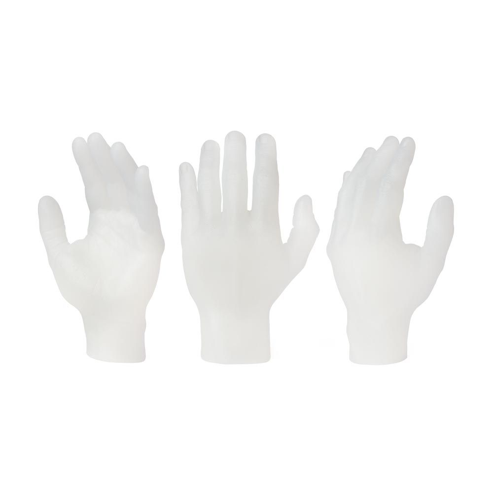 Three clear hands made of tattooable flesh on a white background.