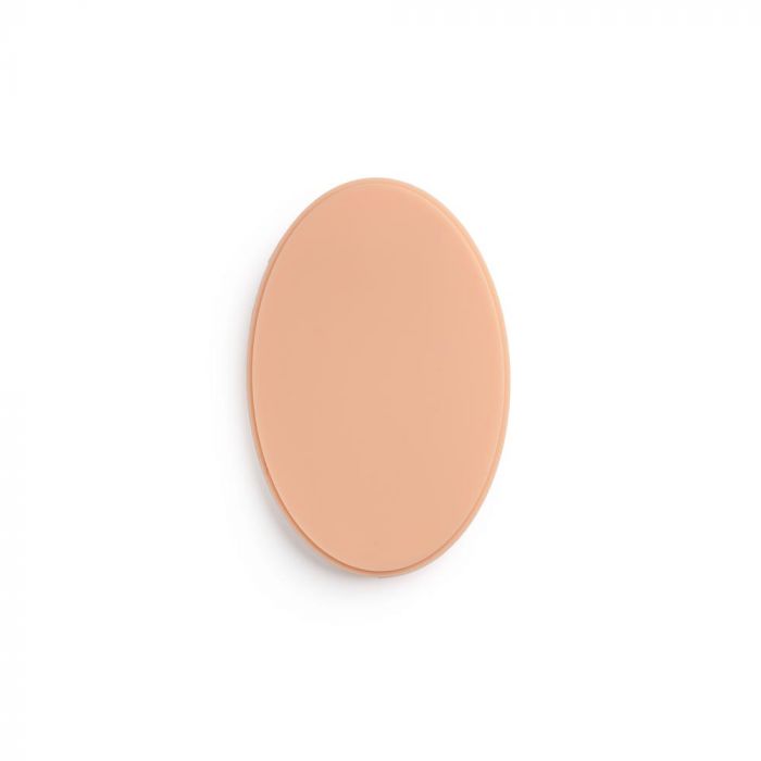 Light-toned oval of tattooable flesh on a white background.