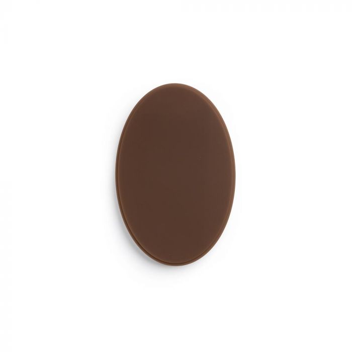 Dark-toned oval of tattooable flesh on a white background.