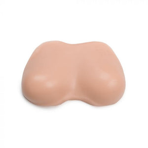 Light-toned tattooable flesh in the shape of female breasts on a white background.