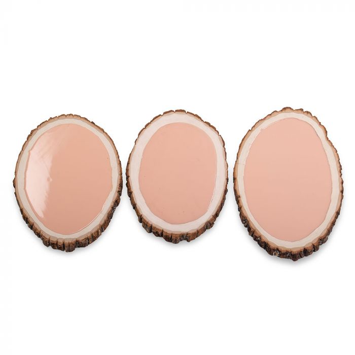Three tattooable flesh slabs imbedded in a frame that looks like a wooden slab from the branch of a tree. This product is posed in front of a white background.