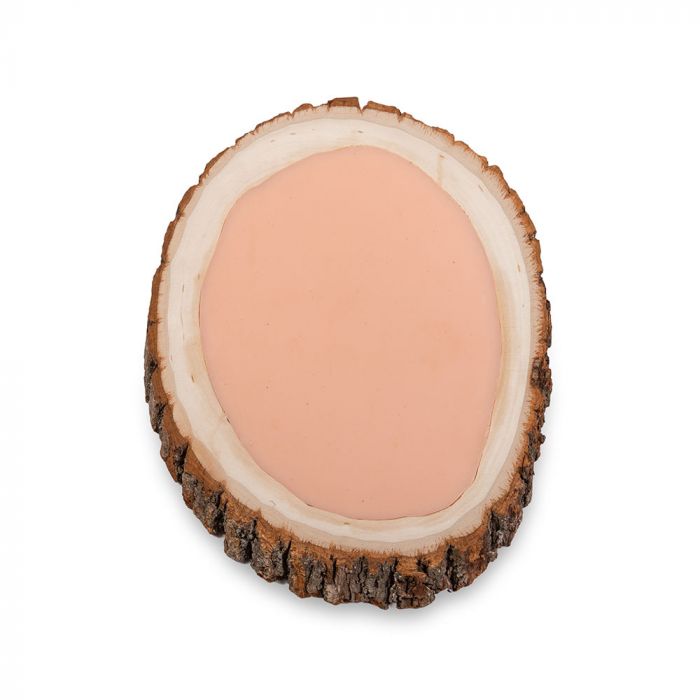 Tattooable flesh imbedded in a frame that looks like a wooden slab from the branch of a tree. This product is posed in front of a white background.