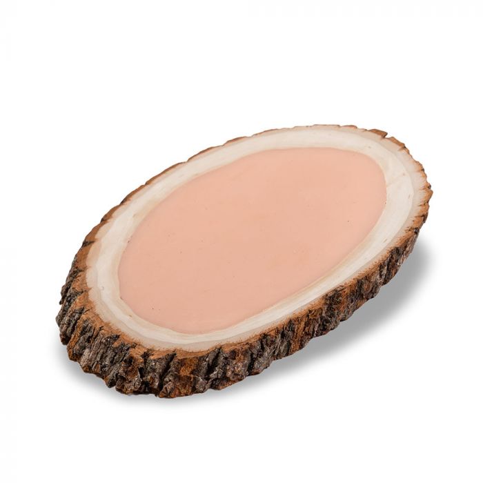 Tattooable flesh imbedded in a frame that looks like a wooden slab from the branch of a tree. This product is posed in front of a white background.