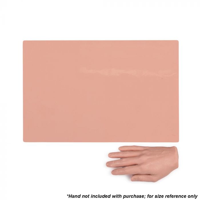 Pink-toned tattooable flesh in the shape of a horizontal rectangle laying next to a hand for size reference on a white background.